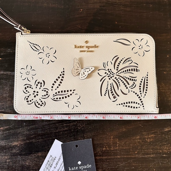 Kate Spade White Floral Cutout Wristlet - Picture 1 of 5
